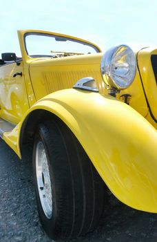 Classic yellow car - wing view                                