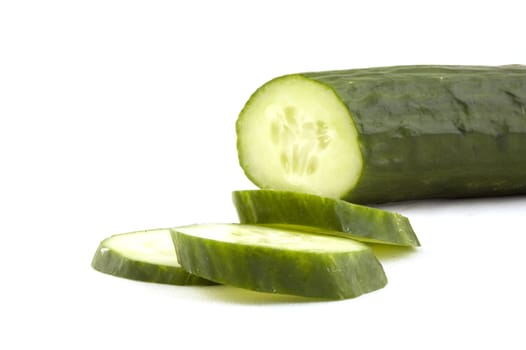 cucumber with slices isolated on white