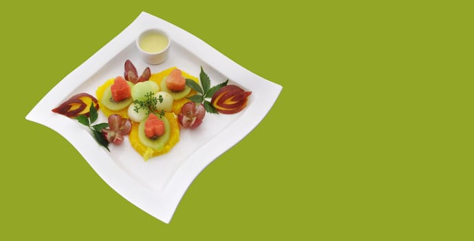 Nice healthful, fresh fruits composition on the beautifull plate