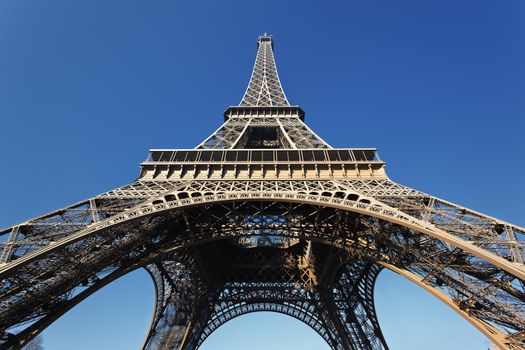 The famous Eiffel tower with blue sky in Paris