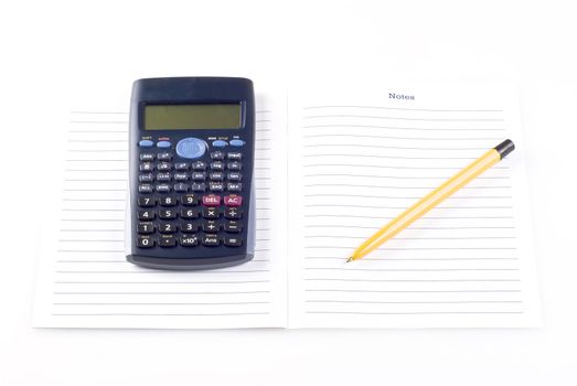 Calculator with notebook and pen