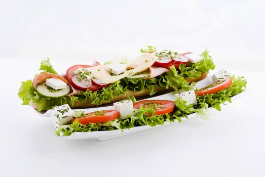 Fresh vegetable and ham sandwich - isolated