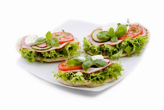 Fresh vegetable sandwiches on pitta bread - isolated