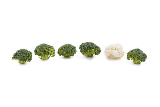 Group of broccoli and one cauliflower between them