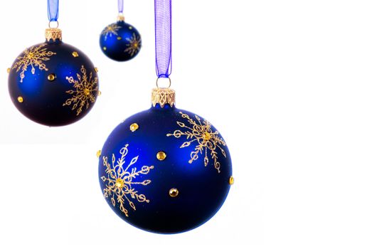 Blue Christmas balls over white background - isolated