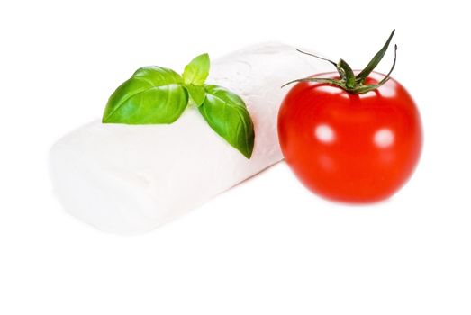 Fresh tomato, basil and mozzarella cheese on white background