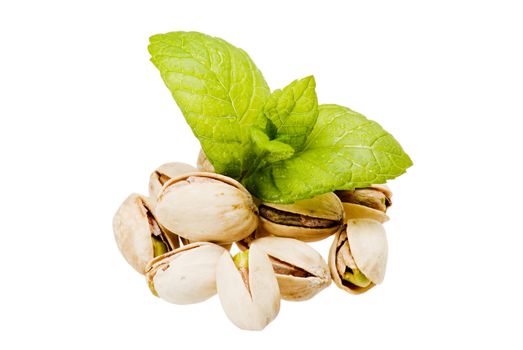 Closeup pistachios and fresh mint on white backgroud