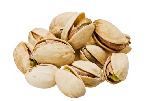 Closeup pistachios over white background, isolated