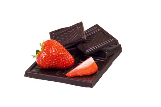 Dark chocolate and strawberries over white background