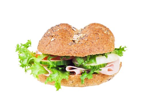 Fresh sandwich with ham and vegetables over white background