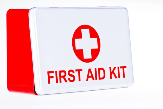 First aid kit box over white background