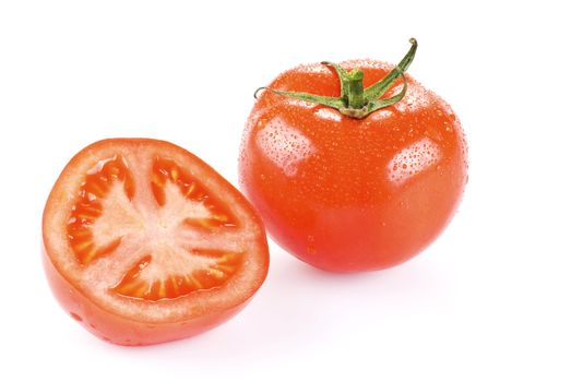 Fresh tomato with one half over white background