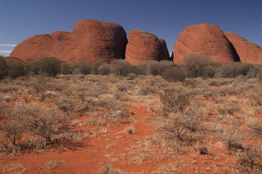 Red domes of the Kata Tjuta rock formation in the Australian desert