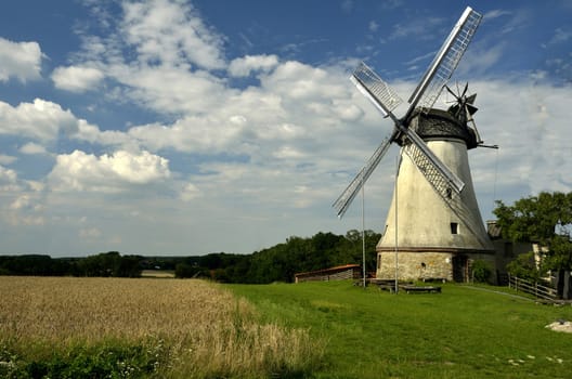 Windmill. Rural landscape in West Germany