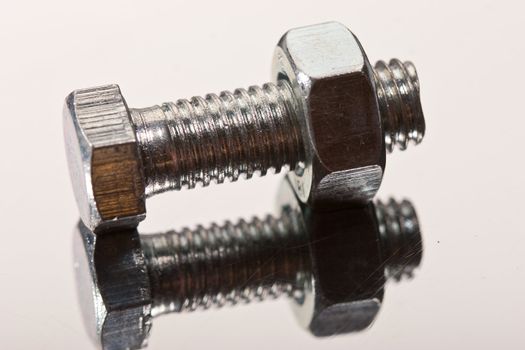 tools series: close up of steel bolt and screw-nut