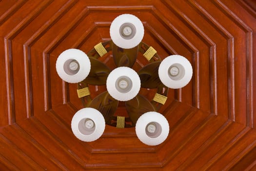 Lamp on the ceiling of Thai wood house at Thailand