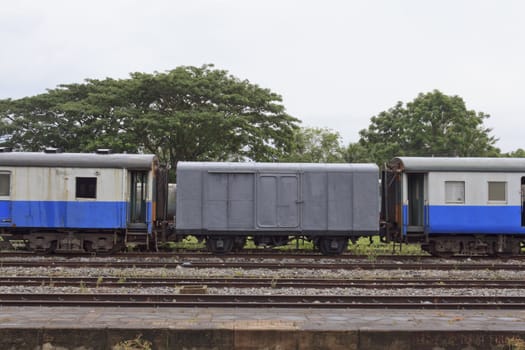 Old Thai public train at railway station in Thailand