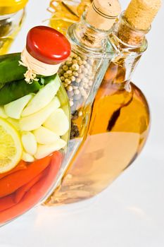 food series: full olive oil glassy bottle with spicies