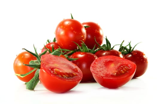 fresh, red tomatoes on white background