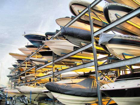 A rack of speed boats waiting for the water.