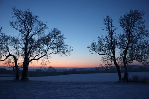 Sunset over a snowy scene