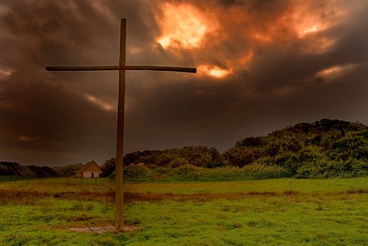 Cross with dark skies