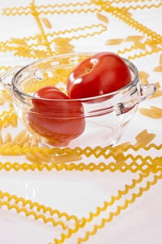 food series: uncooked pasta in glassy bowl