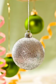 Holiday series:  Christmas decorated silver bal and streamer