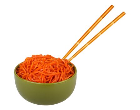 salad of carrots in a green bowl with chopsticks