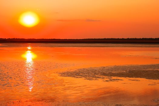 Sunset over the marsh in a fine summer evening