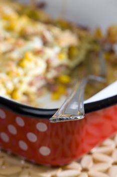 pasta baked with smoked meat and corn