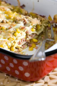 pasta baked with smoked meat and corn