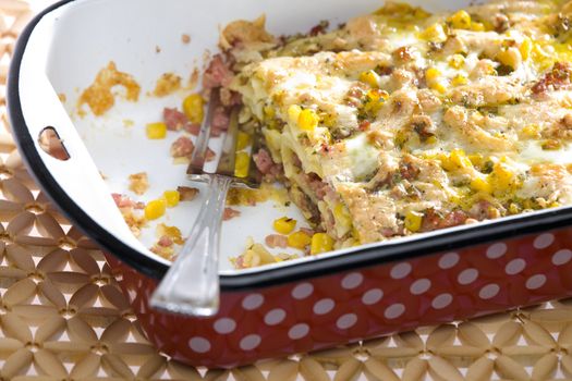 pasta baked with smoked meat and corn