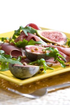 Spanish ham with figs and pine nuts