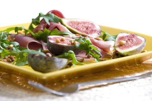 Spanish ham with figs and pine nuts