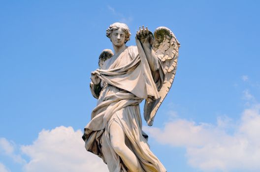 Ancient marble sculpture of angel on the bridge in Rome, Italy