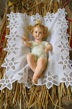 A baby Jesus figure on Christmas