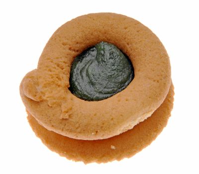 Cats eye cookie, cakes with green marmalade, isolated with clippinig path on white background