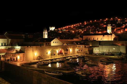 Stari Grad ( Old Town ) and famoust historic harbor in Dubrovnik – Croatia by night.