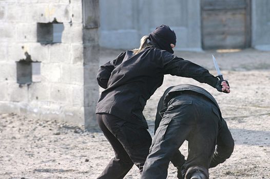 special troops training fights. woman and man                                