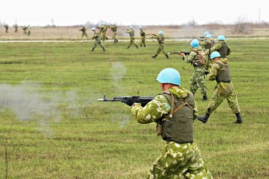 soldier in a combat uniform attack