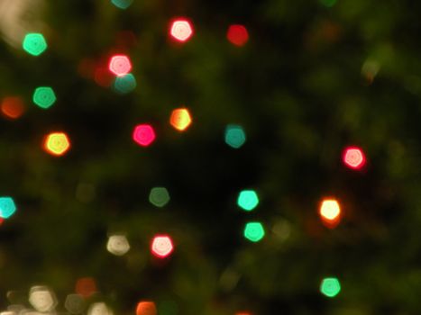 Christmas lights on a tree, blurred intentionally