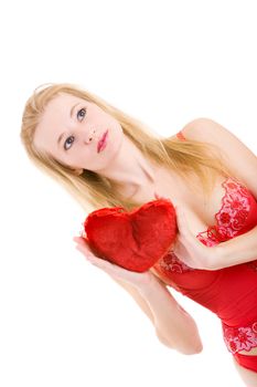 pretty blond girl with a red pillow heart