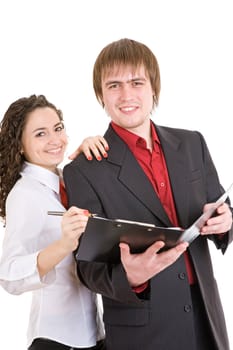 smiling man and woman dressed for office stand with a carpet