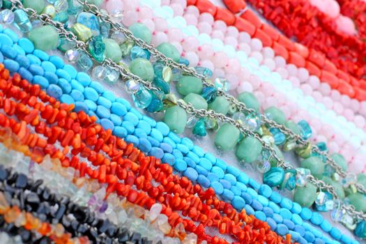 Close up of the different beads made of gemstones