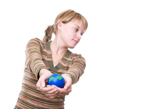 Young girl holds globe in hands