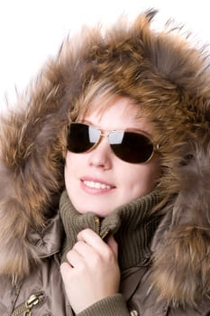 The blonde in sunglasses in a jacket with a fur collar