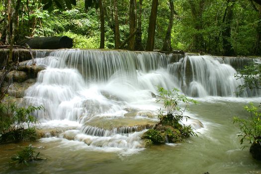 Waterfall in deep forest at Kanchanaburi, Thailand 