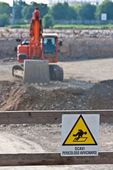 Sign of danger for work in progress (Italian) in a building site