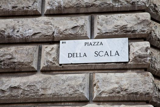 Street sign of famous interesting point in Milan center - Italy